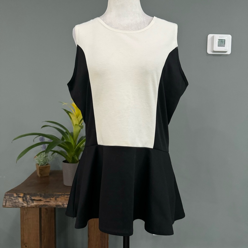 Abria Sleeveless Peplum Top